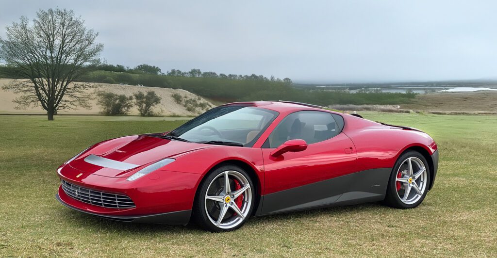 A sleek red Ferrari sports car, inspired by Eric Claptons Ferrari SP12EC, with silver accents is parked on green grass in front of sandy hills and a cloudy sky.